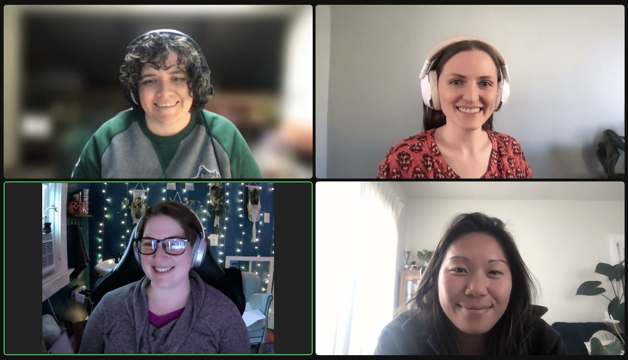 A mentor works with a participant at a laptop.